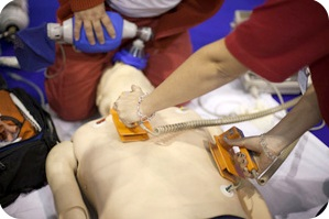 Person learning AED.